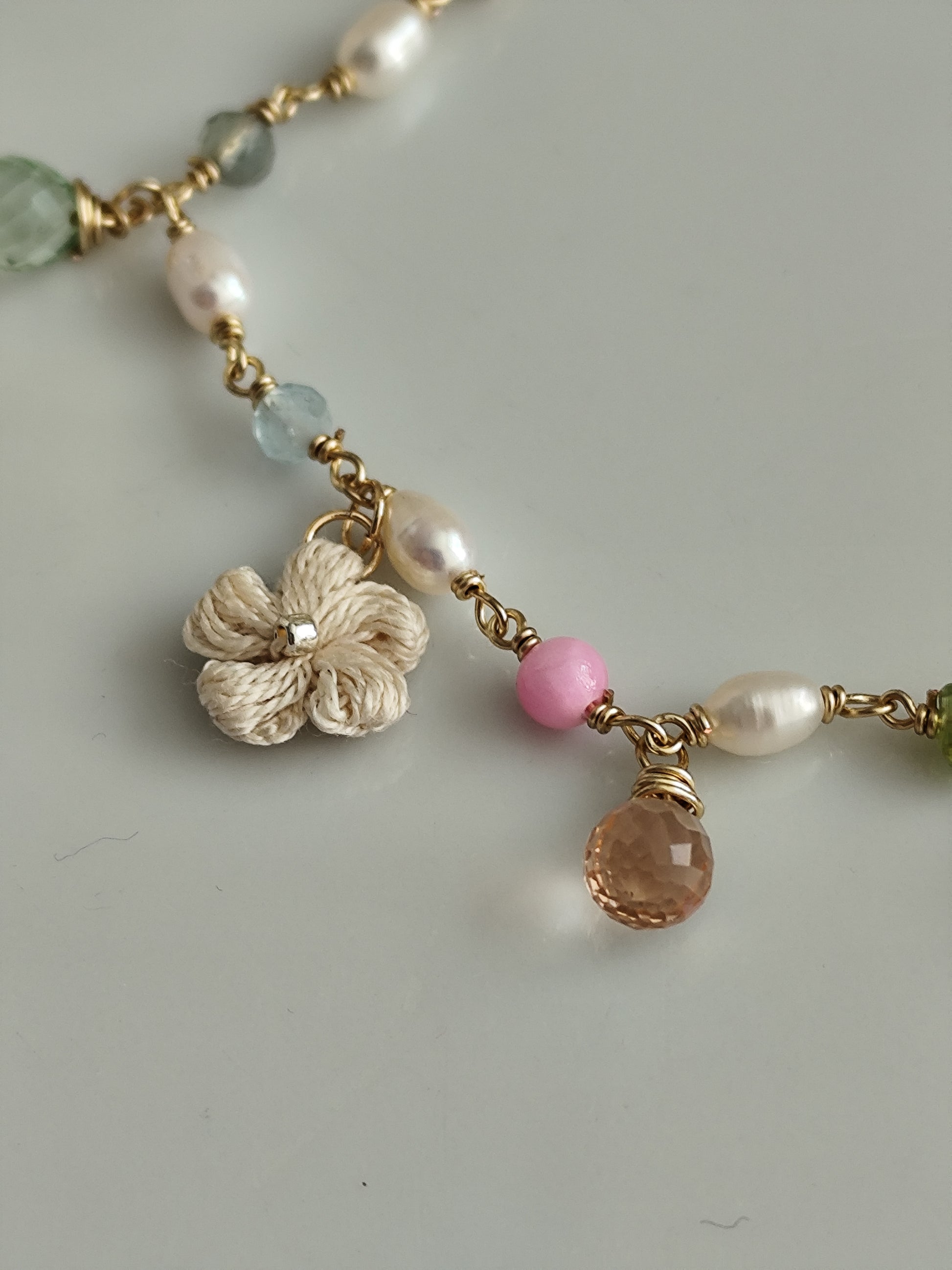Pearl gemstone colorful bracelet with quartz beads and crocheted flowers