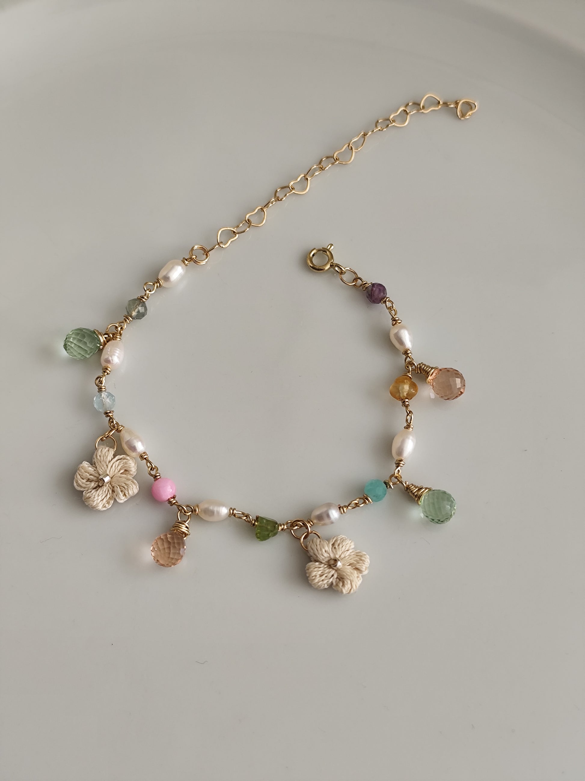 Pearl gemstone colorful bracelet with quartz beads and crocheted flowers