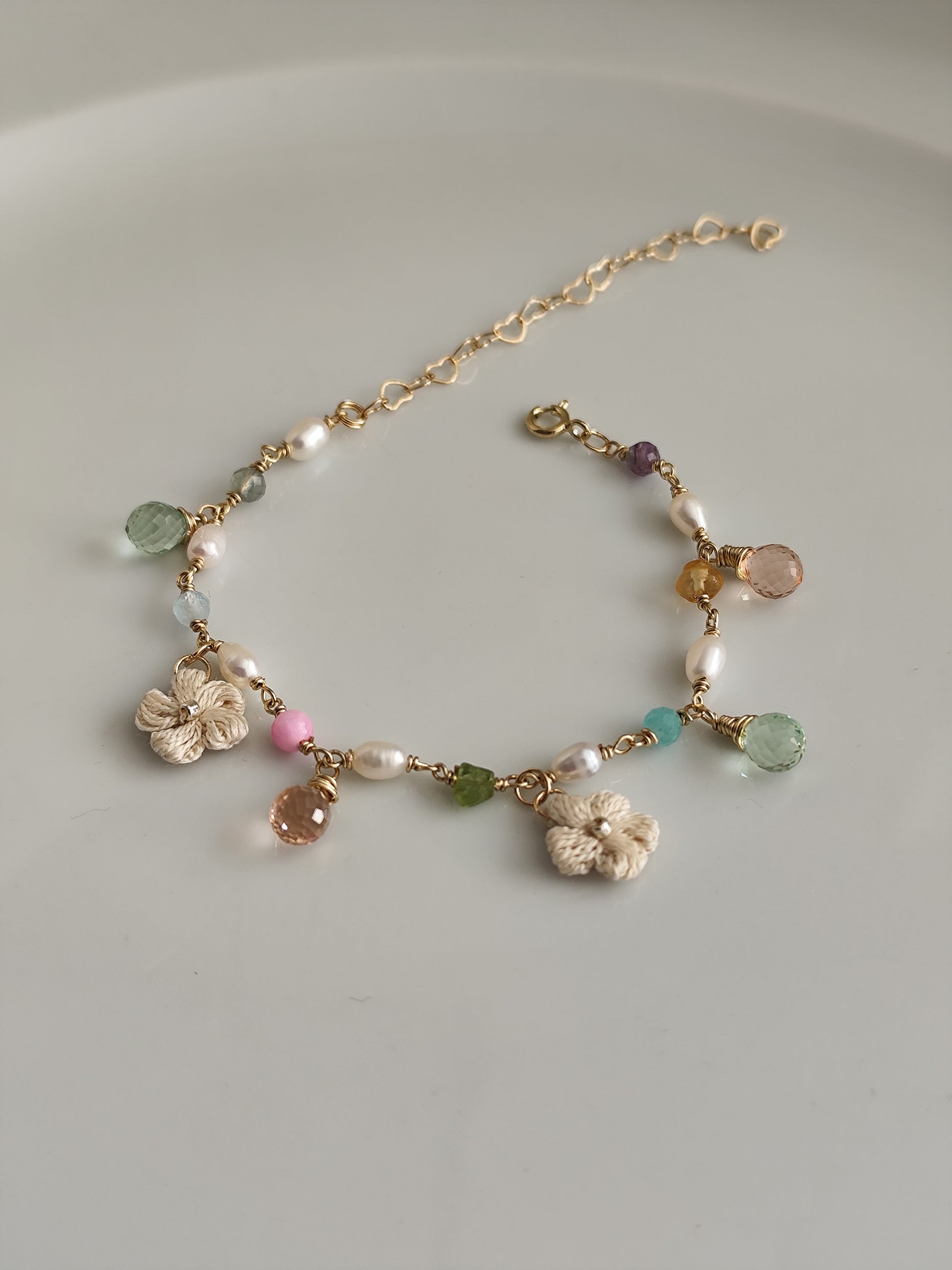 Pearl gemstone colorful bracelet with quartz beads and crocheted flowers