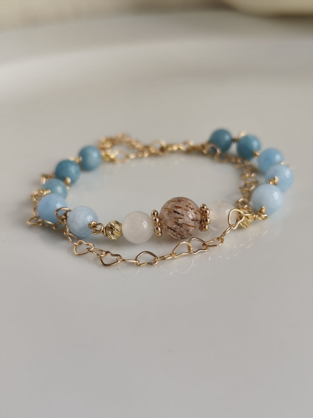 Gemstone bracelet with heart shaped chain