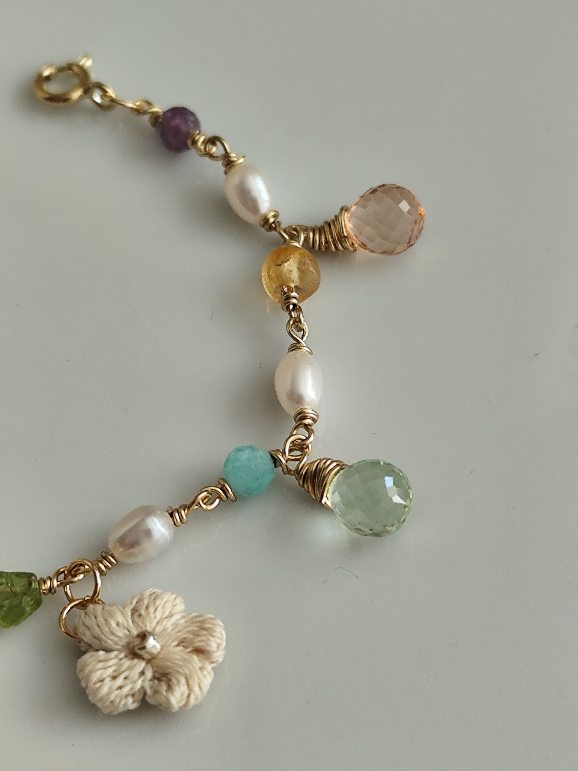 Pearl gemstone colorful bracelet with quartz beads and crocheted flowers