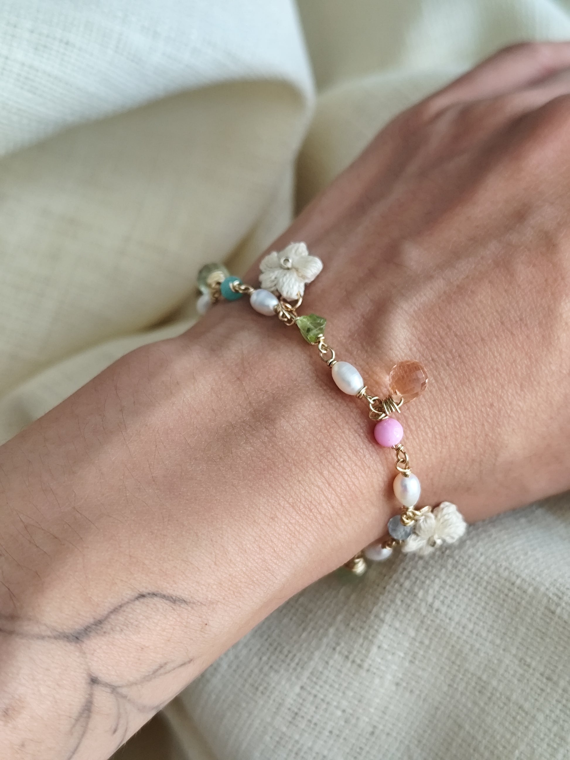 Pearl gemstone colorful bracelet with quartz beads and crocheted flowers